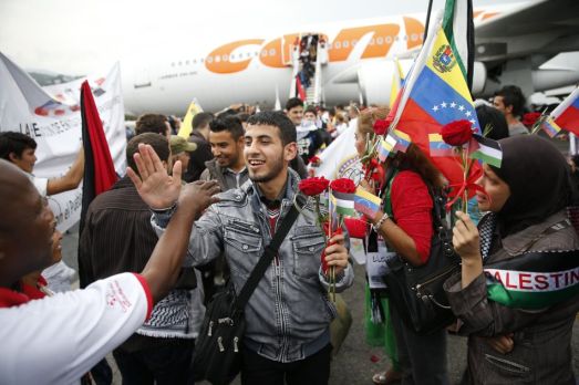 Palestinian students arrive at Simon Bolivar airport outside Caracas